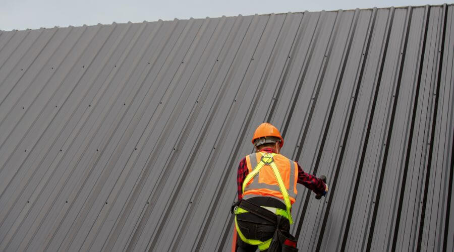 Professional metal roof installation services in Sheldon, MO